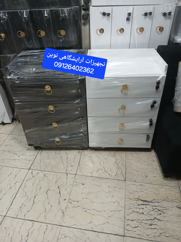 ترولی ارایشگاهی ۴کشو قفلدار دررنگ بندی سفیدومشکی