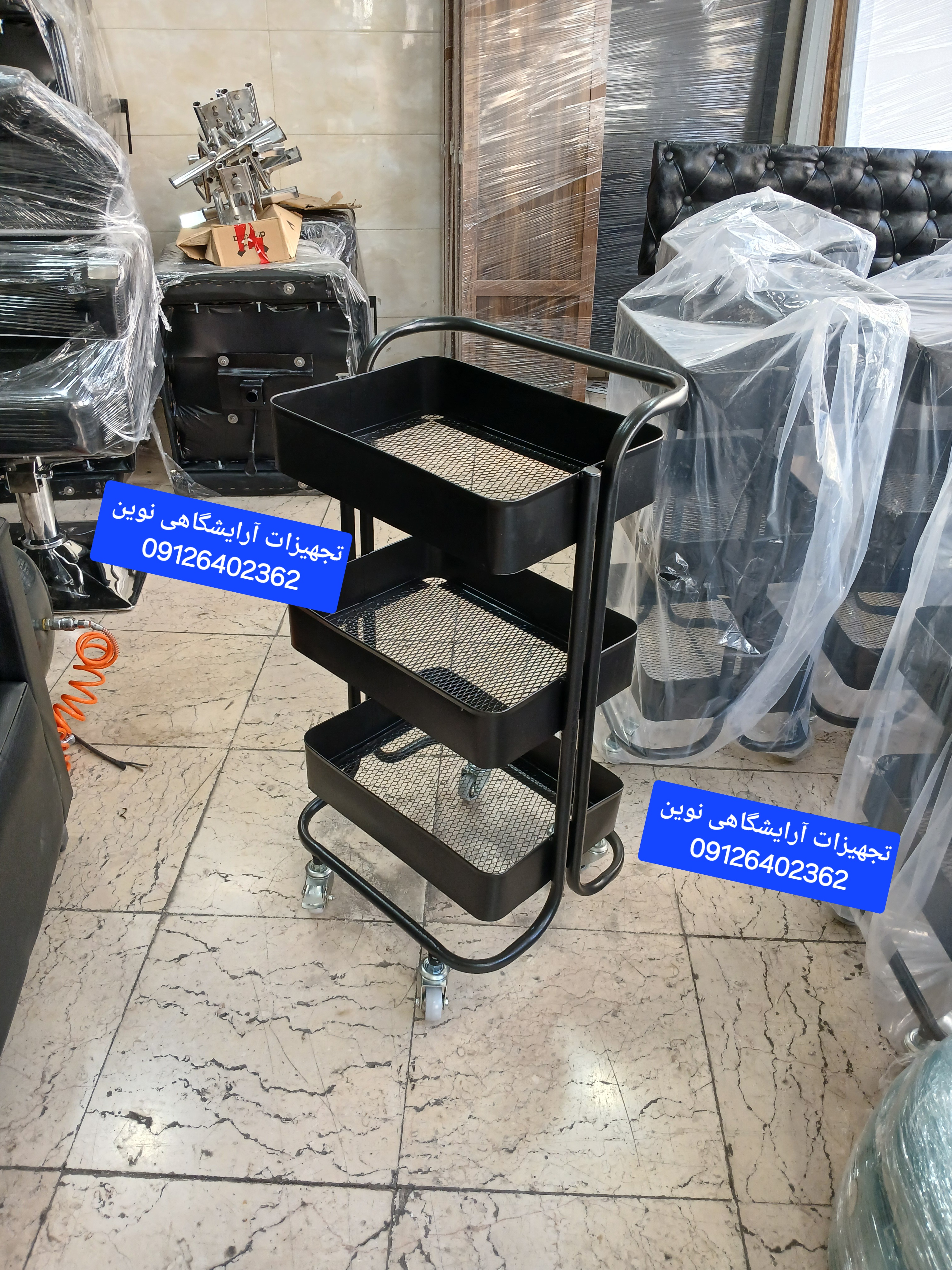 ترولی آرایشگاهی فلزی چرخدار شیک دررنگ بندی سفیدومشکی